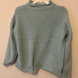 Light blue sweater